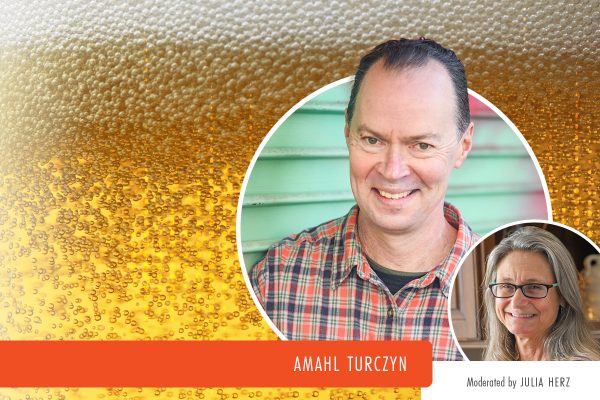 amahl turczyn and julia herz in front of beer head