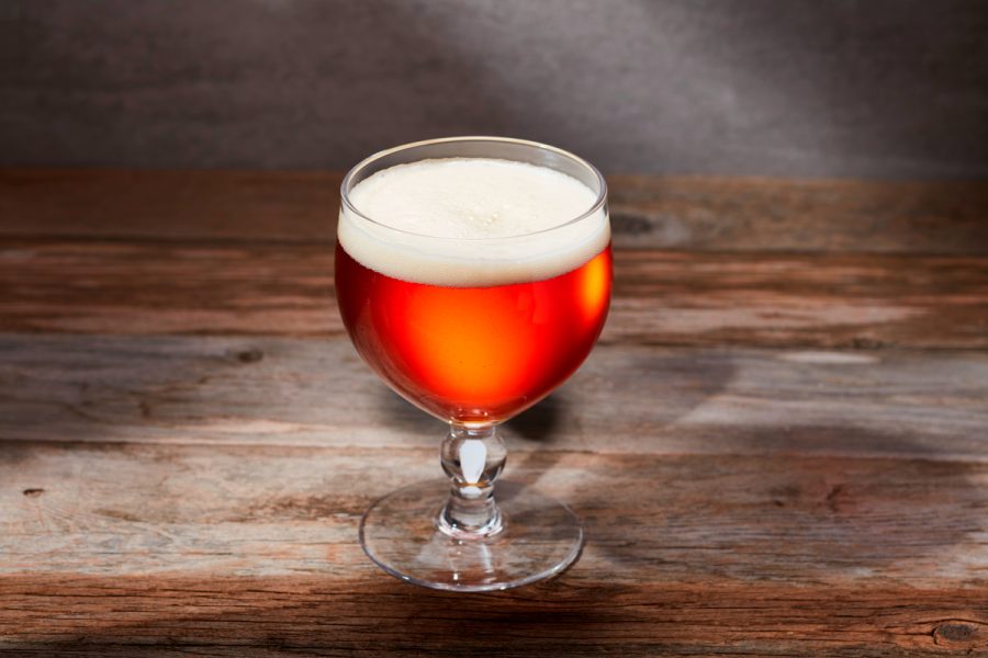 copper-colored beer in glass goblet