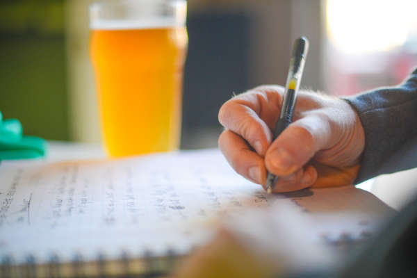 hand writing with beer present