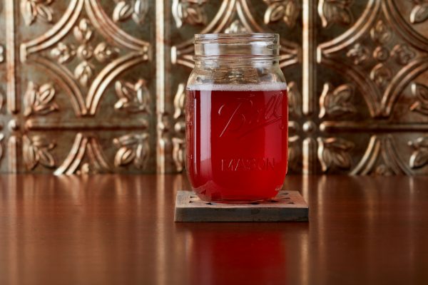 jar of beer, mead, cider, or kombucha. red color