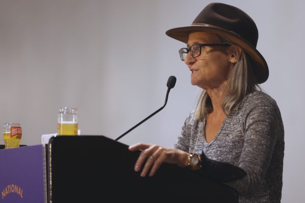 Julia Herz presenting at the NHC 2024 awards