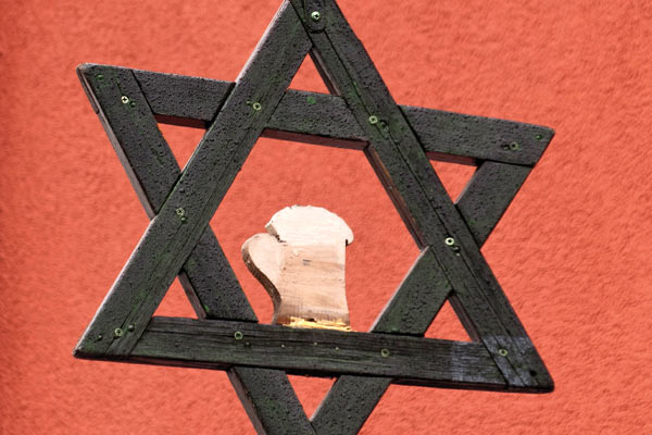 Wooden Star of David with a beer inside it
