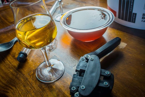 glass of mead with honey and capper