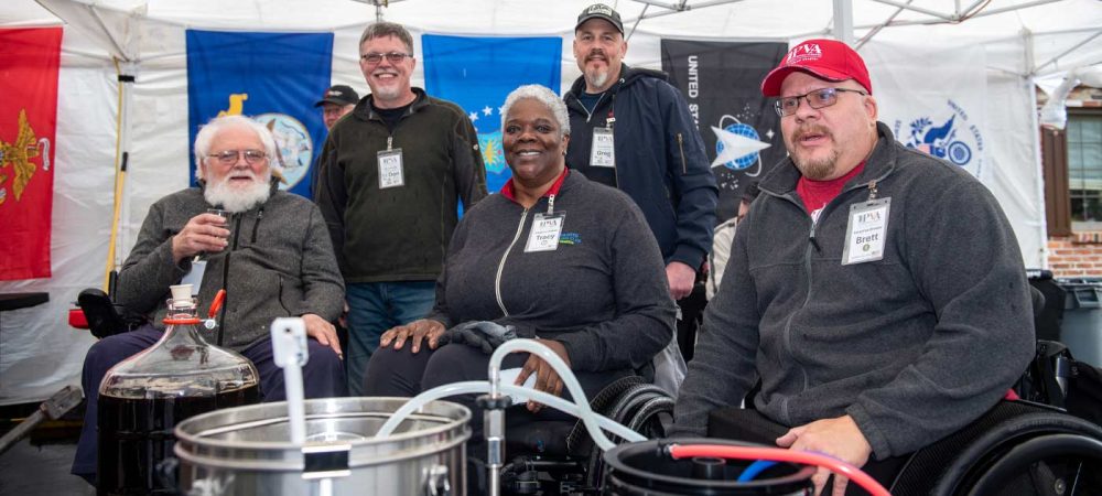 homebrewers around a kettle