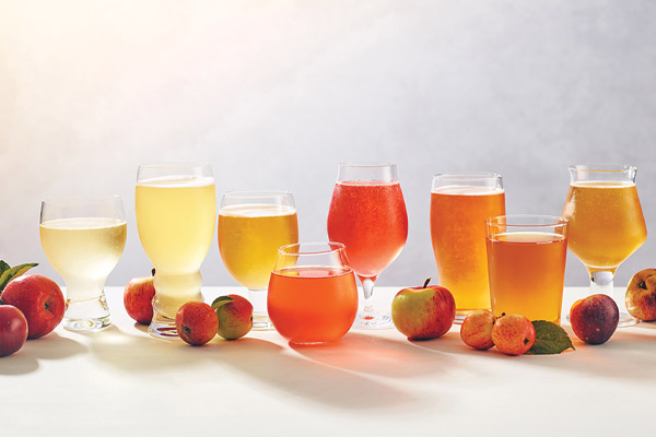An array of ciders and apples