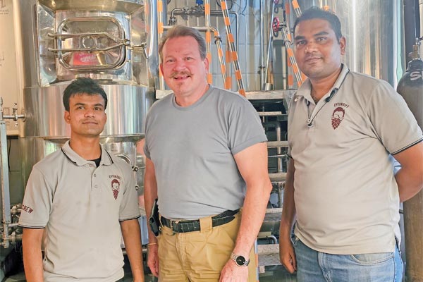Homebrewer Hobbs in India with commercial brewers