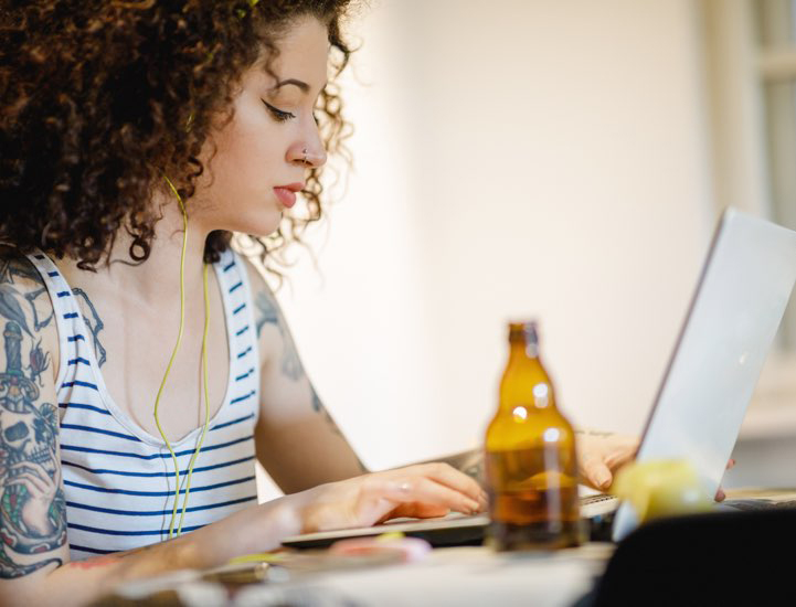 woman reading at computer